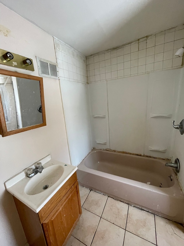 14811 Robson St, Detroit, MI 48227 - bathroom with tile patterned floors, vanity, washtub / shower combination, and visible vents