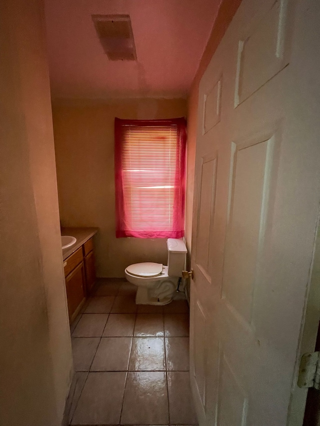 14811 Robson St, Detroit, MI 48227 - half bath featuring visible vents, toilet, tile patterned flooring, and vanity