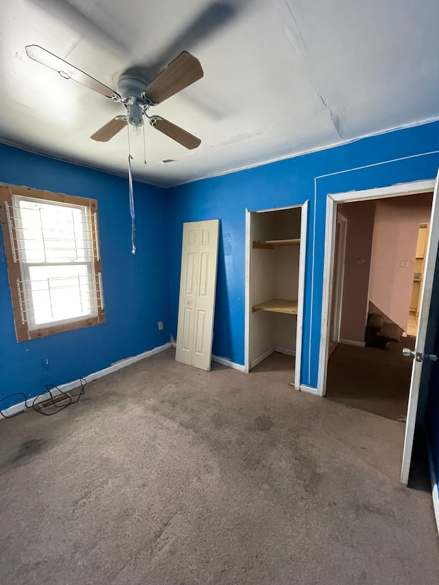 14811 Robson St, Detroit, MI 48227 - unfurnished bedroom featuring carpet floors, baseboards, multiple closets, and ceiling fan