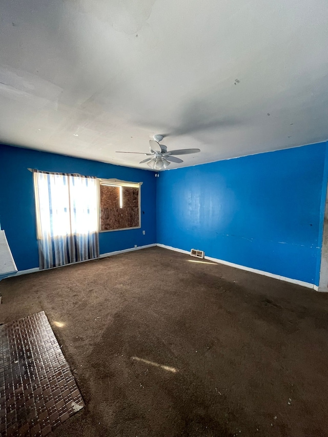 14811 Robson St, Detroit, MI 48227 - unfurnished room featuring baseboards, visible vents, and ceiling fan