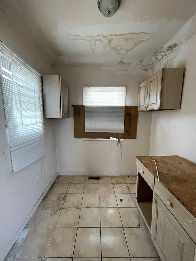 14811 Robson St, Detroit, MI 48227 - kitchen with baseboards and light tile patterned floors