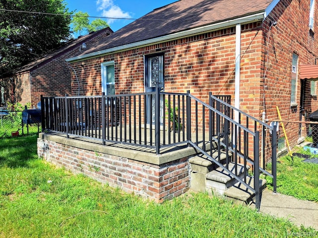 17561 Greenview Ave, Detroit, MI 48219 - back of house with brick siding and a shingled roof