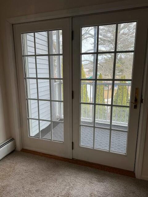 entryway with a healthy amount of sunlight and carpet