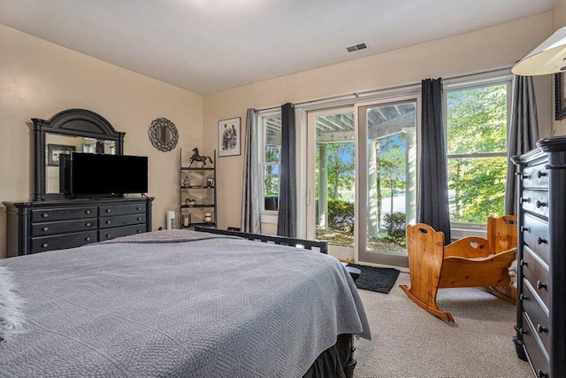 carpeted bedroom with visible vents