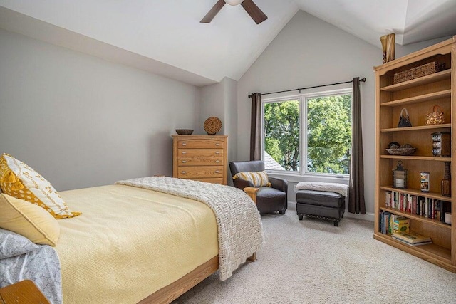 carpeted bedroom with lofted ceiling and ceiling fan