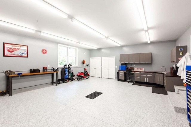 garage with a sink