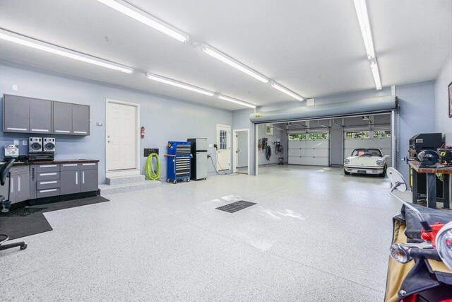 garage with freestanding refrigerator