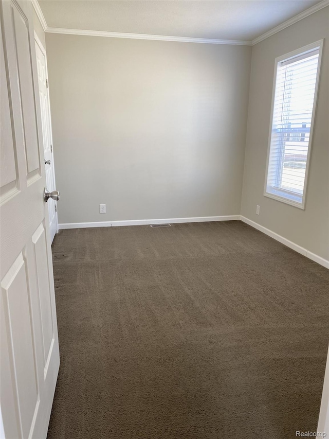 33123 Aspen Ct, New Haven, MI 48048 - empty room with crown molding and dark colored carpet
