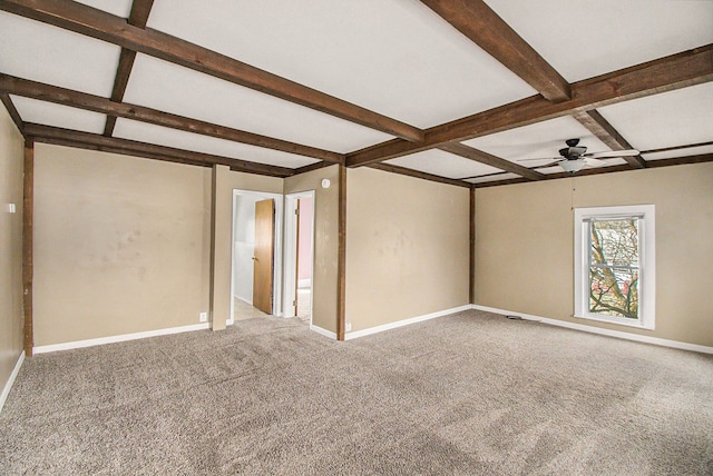 54 Division St, Oxford, MI 48371 - spare room featuring carpet flooring, a ceiling fan, beam ceiling, and baseboards