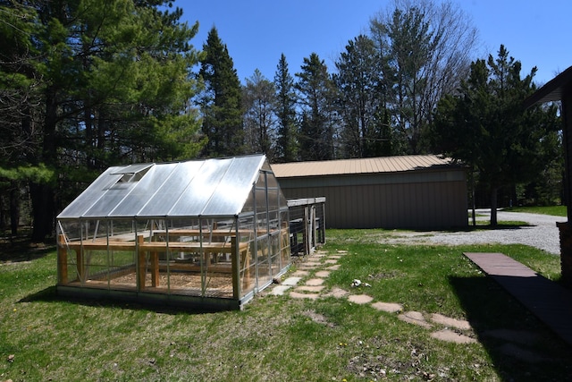 4331 N Burr Oak Rd, Lincoln, MI 48742 - view of greenhouse featuring a lawn