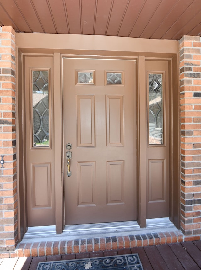 4331 N Burr Oak Rd, Lincoln, MI 48742 - view of exterior entry with brick siding