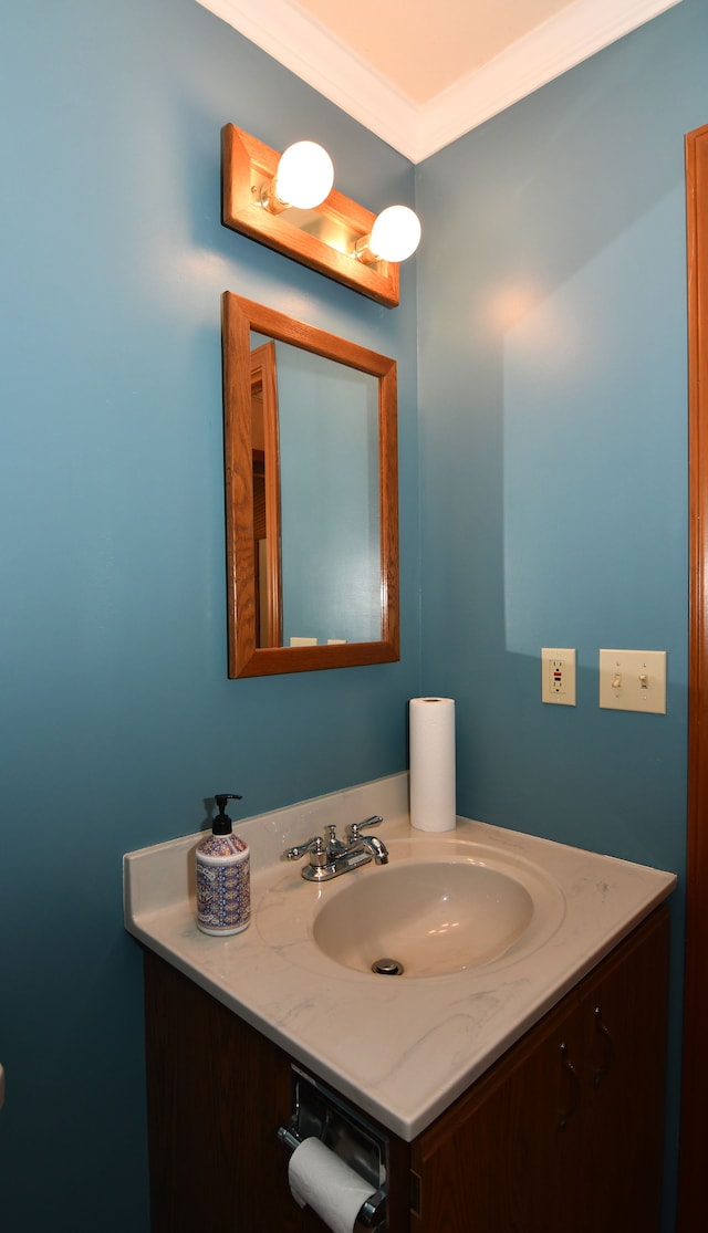 4331 N Burr Oak Rd, Lincoln, MI 48742 - bathroom featuring vanity and crown molding