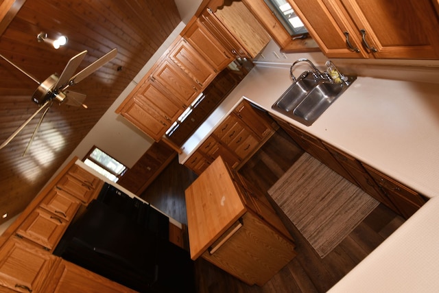4331 N Burr Oak Rd, Lincoln, MI 48742 - kitchen featuring a sink, wood finished floors, light countertops, and plenty of natural light