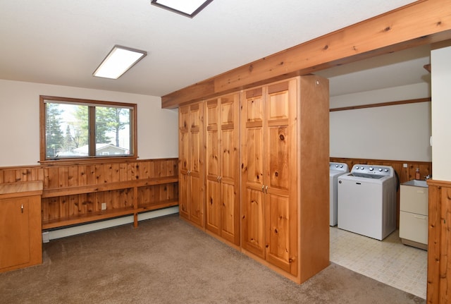 4331 N Burr Oak Rd, Lincoln, MI 48742 - additional living space with a baseboard radiator, separate washer and dryer, a wainscoted wall, wood walls, and carpet floors