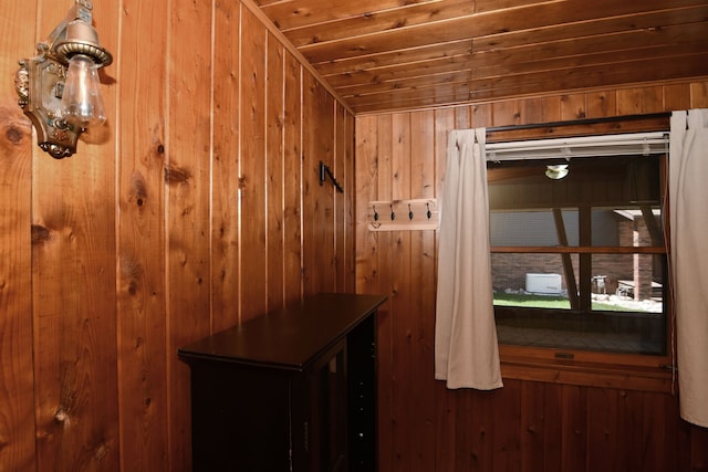 4331 N Burr Oak Rd, Lincoln, MI 48742 - corridor featuring wood walls and wood ceiling