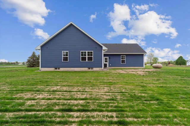 4050 Cayman Dr, Dewitt, MI 48820 - rear view of property featuring a yard
