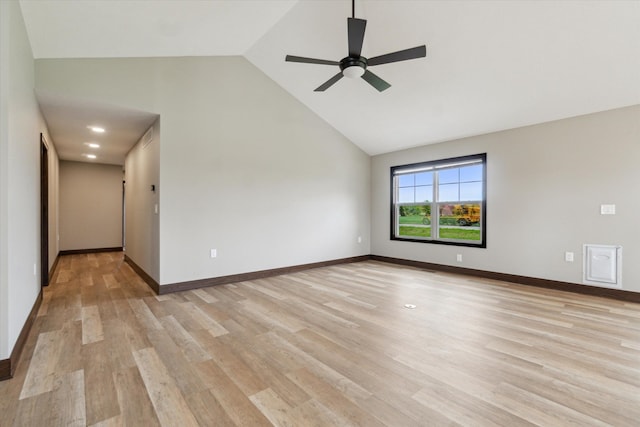 4050 Cayman Dr, Dewitt, MI 48820 - unfurnished room with high vaulted ceiling, ceiling fan, light wood-style flooring, and baseboards