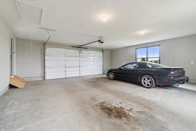 4050 Cayman Dr, Dewitt, MI 48820 - garage with a garage door opener
