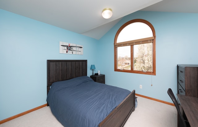 448 Marblewood Ln, Saline, MI 48176 - carpeted bedroom featuring lofted ceiling and baseboards