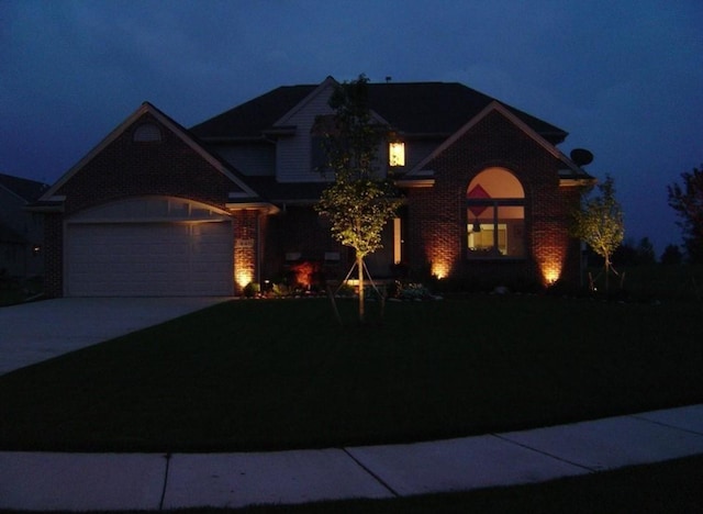 448 Marblewood Ln, Saline, MI 48176 - view of front facade with concrete driveway, brick siding, and a garage