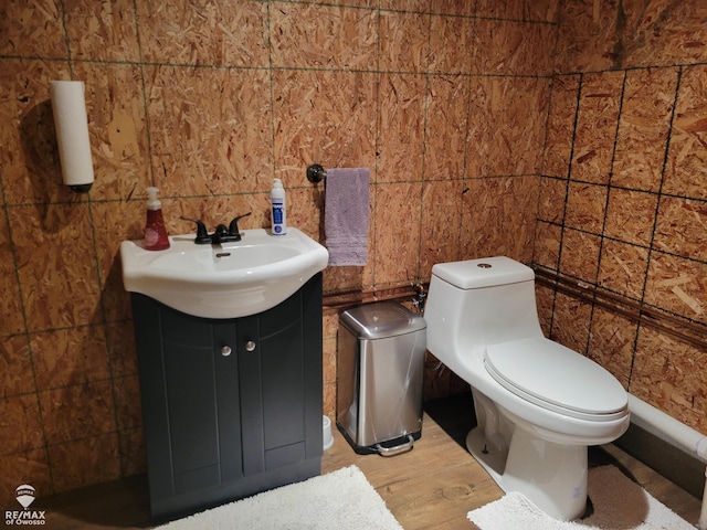 6375 S Byron Rd, Durand, MI 48429 - bathroom featuring toilet, wood finished floors, and vanity
