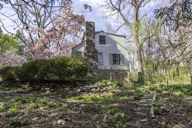 3122 Geddes Ave, Ann Arbor, MI 48104 - view of side of property with a chimney