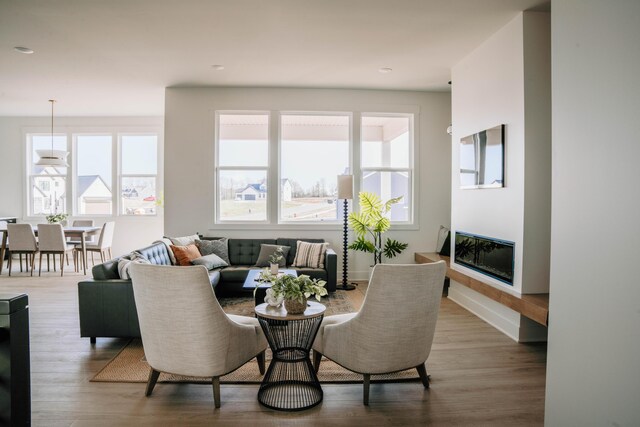 8120 Byron Depot Dr SW, Byron Center, MI 49315 - living area featuring wood finished floors and recessed lighting