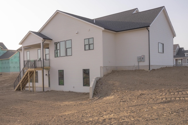 8120 Byron Depot Dr SW, Byron Center, MI 49315 - back of property with stairs and a shingled roof