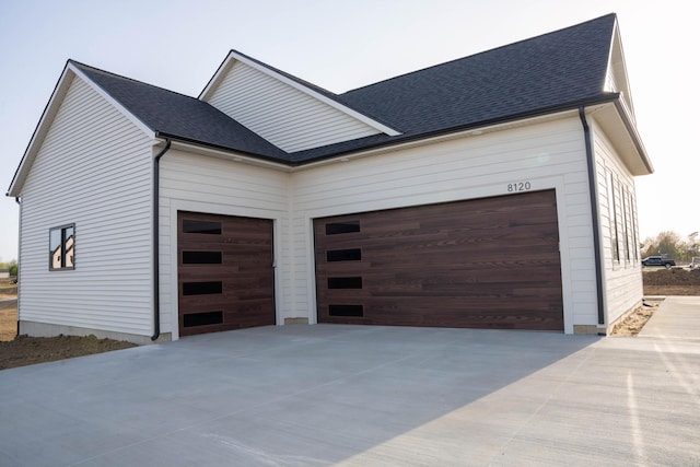 8120 Byron Depot Dr SW, Byron Center, MI 49315 - garage featuring concrete driveway
