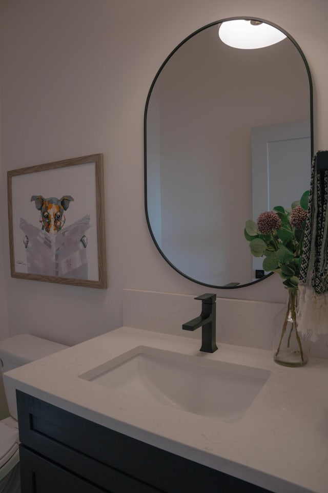 8120 Byron Depot Dr SW, Byron Center, MI 49315 - bathroom featuring toilet and vanity