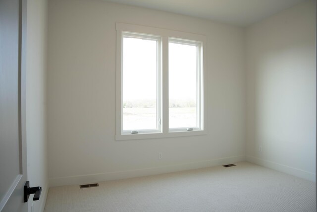 8120 Byron Depot Dr SW, Byron Center, MI 49315 - carpeted spare room featuring baseboards