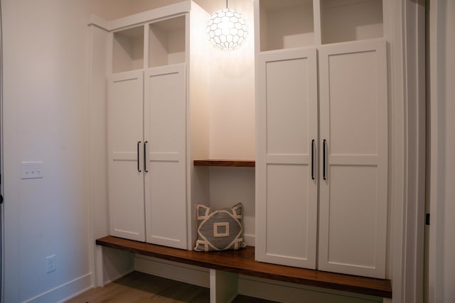 8120 Byron Depot Dr SW, Byron Center, MI 49315 - mudroom with baseboards and wood finished floors