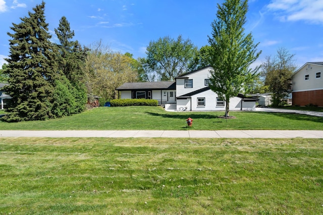 30728 W 14 Mile Rd, West Bloomfield, MI 48322 - tri-level home with a front lawn and driveway