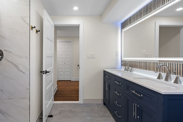 30728 W 14 Mile Rd, West Bloomfield, MI 48322 - bathroom featuring double vanity, baseboards, tile patterned floors, and recessed lighting