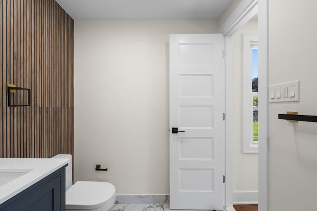 30728 W 14 Mile Rd, West Bloomfield, MI 48322 - bathroom featuring baseboards, marble finish floors, toilet, and vanity