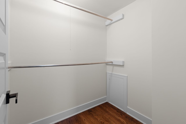 30728 W 14 Mile Rd, West Bloomfield, MI 48322 - spacious closet featuring dark wood-style flooring