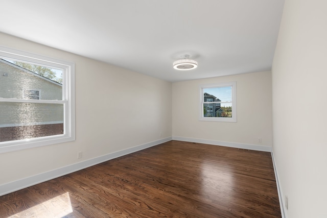 30728 W 14 Mile Rd, West Bloomfield, MI 48322 - spare room featuring wood finished floors and baseboards