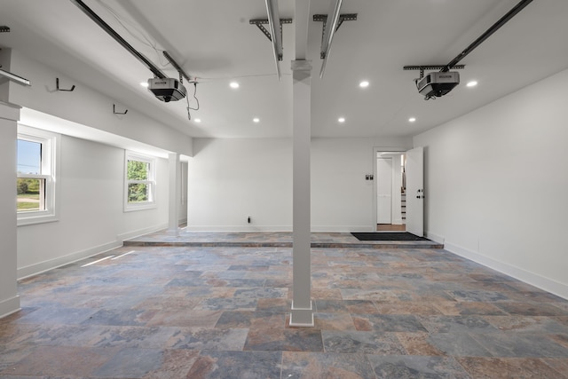30728 W 14 Mile Rd, West Bloomfield, MI 48322 - garage with a garage door opener, baseboards, and recessed lighting