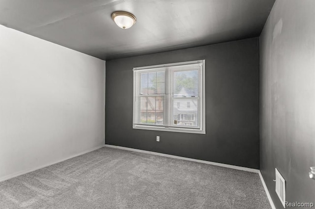 2947 Glynn, Detroit, MI 48206 - spare room featuring carpet floors, baseboards, and visible vents