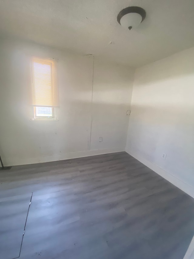 4543 Harriet St, Inkster, MI 48141 - empty room featuring baseboards and wood finished floors