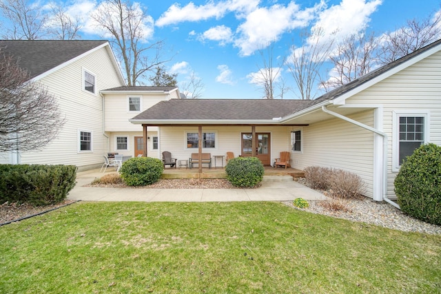 14073 Walz Blvd, Brooklyn, MI 49230 - rear view of house with a patio and a yard