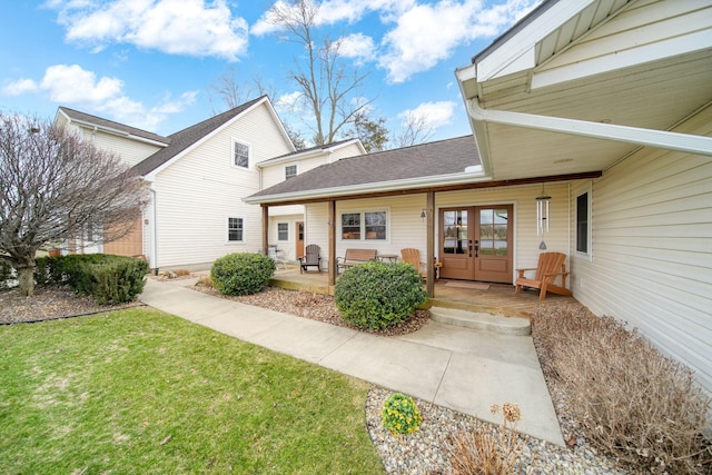 14073 Walz Blvd, Brooklyn, MI 49230 - back of house with a shingled roof, french doors, and a yard