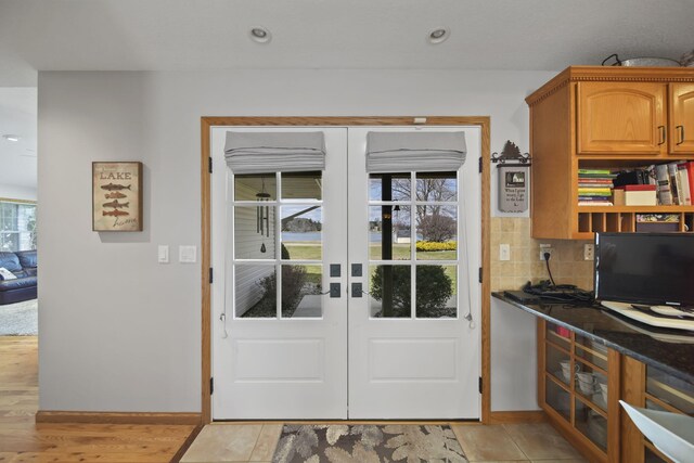 14073 Walz Blvd, Brooklyn, MI 49230 - doorway to outside featuring plenty of natural light, baseboards, and recessed lighting