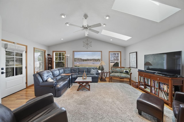 14073 Walz Blvd, Brooklyn, MI 49230 - living area with recessed lighting, ceiling fan, wood finished floors, and lofted ceiling with skylight