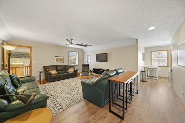14073 Walz Blvd, Brooklyn, MI 49230 - living room with a ceiling fan, hardwood / wood-style flooring, baseboards, and a textured ceiling