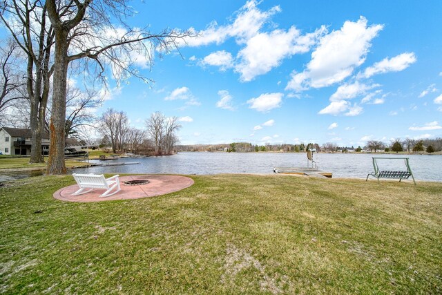 14073 Walz Blvd, Brooklyn, MI 49230 - view of yard featuring an outdoor fire pit, a water view, and a patio