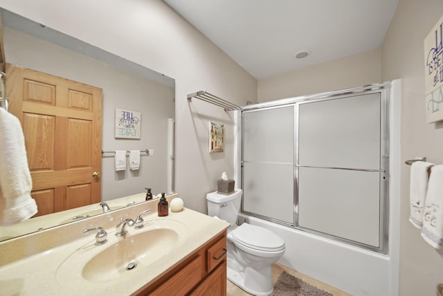 14073 Walz Blvd, Brooklyn, MI 49230 - bathroom featuring toilet, vanity, and combined bath / shower with glass door