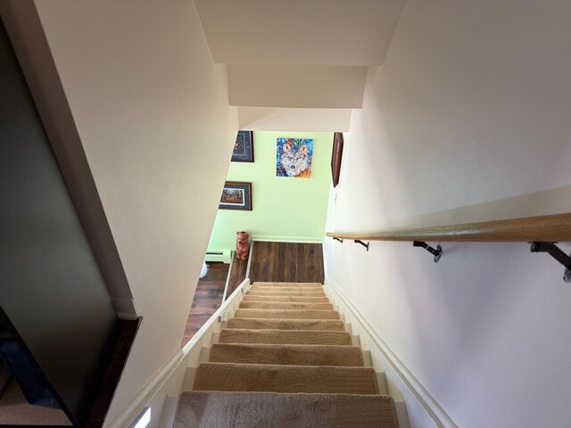 317 Clark St Unit B, Clinton, MI 49236 - staircase featuring baseboard heating