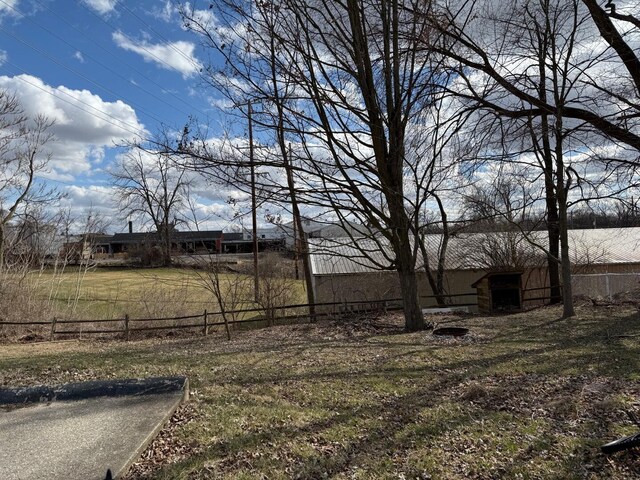 317 Clark St Unit B, Clinton, MI 49236 - view of yard featuring fence
