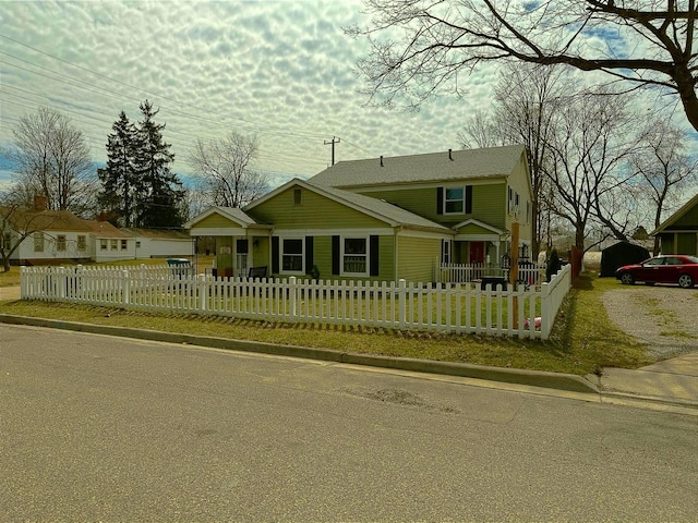 317 Clark St Unit B, Clinton, MI 49236 - view of front of property featuring a fenced front yard